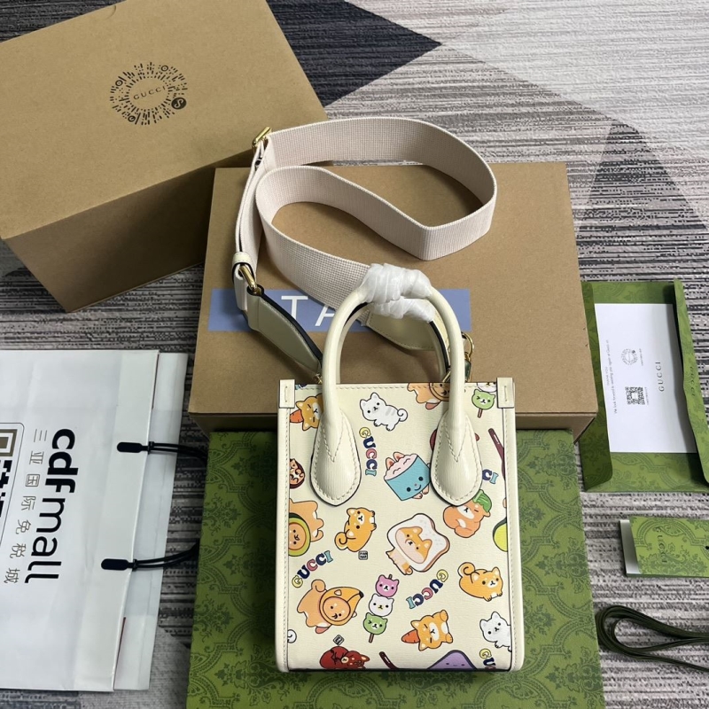 G*u*i top handle bags